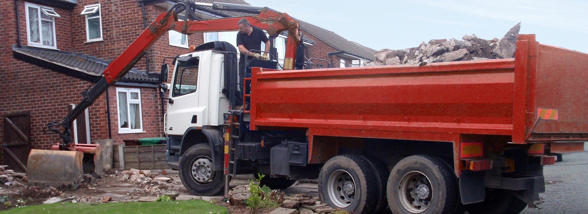 Muck away truck in action